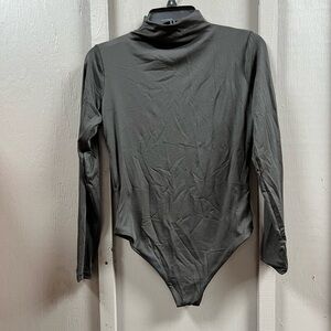 Women’s long sleeve black body suit